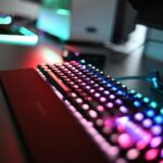 a computer keyboard sitting on top of a desk